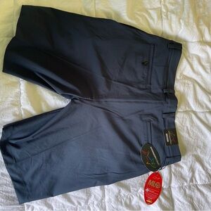 Greg Norman Golf shorts. Size 34